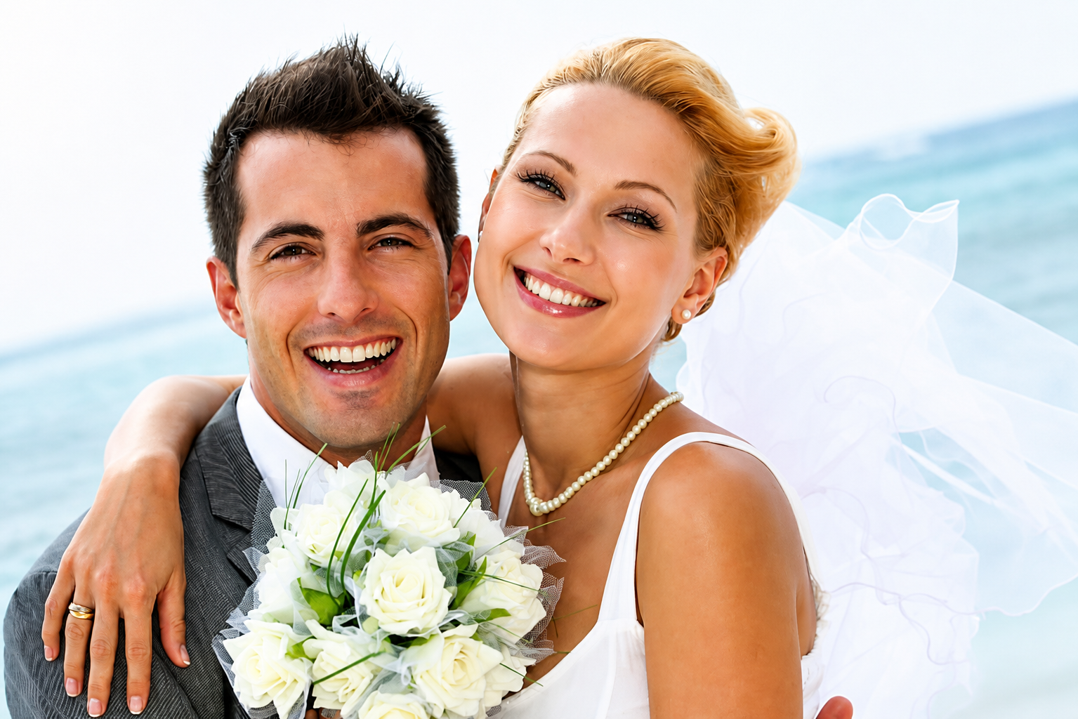 A bride and groom embracing
